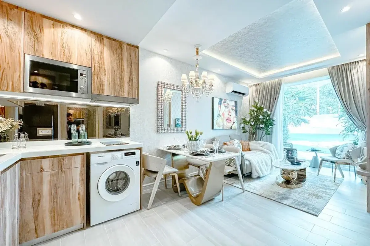 2 Bedroom Condo for Sale at The Riviera Santa Monica open-plan living and dining area with kitchen and large window.