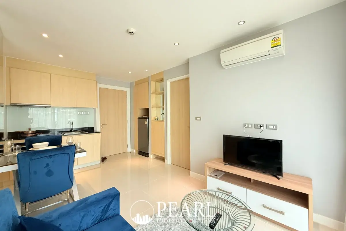 1 Bedroom Condo for Sale in Grande Caribbean modern living room with sofa