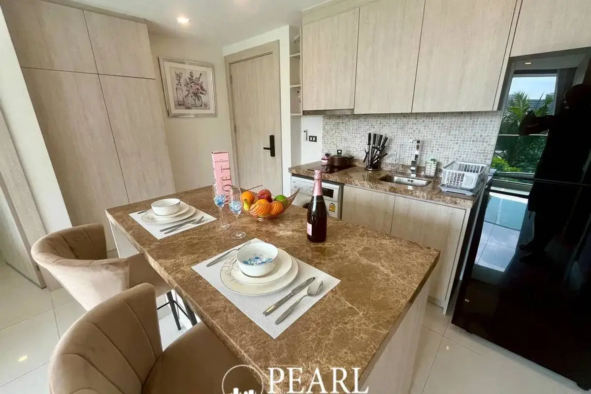 2 Bedroom Condo for Sale in Bang Lamung master bedroom with king-size bed
