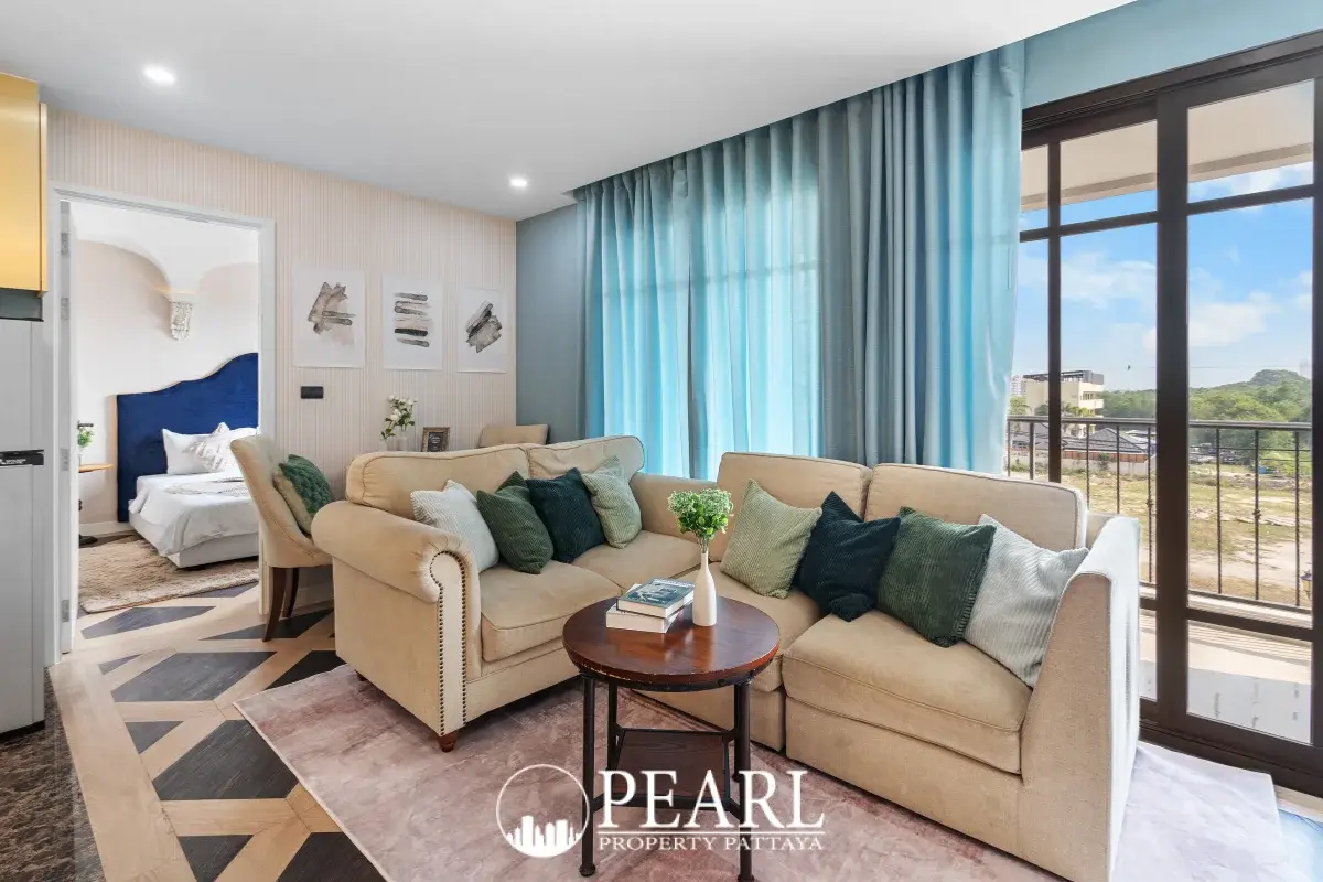 2 Bedroom Condo for Sale & Rent at Espana Condo Resort master bedroom with king-size bed