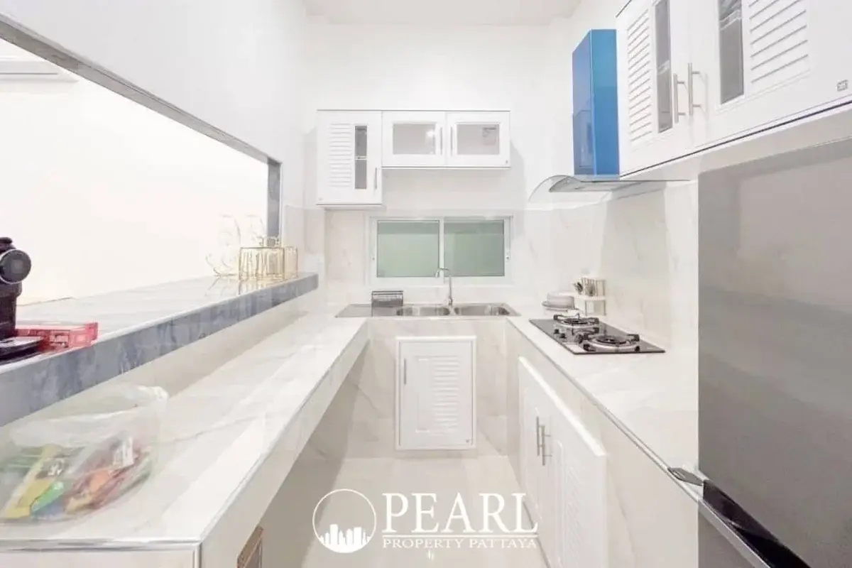 5 Bedroom House for Sale in Thamber Private Pool Villa modern kitchen with island and appliances
