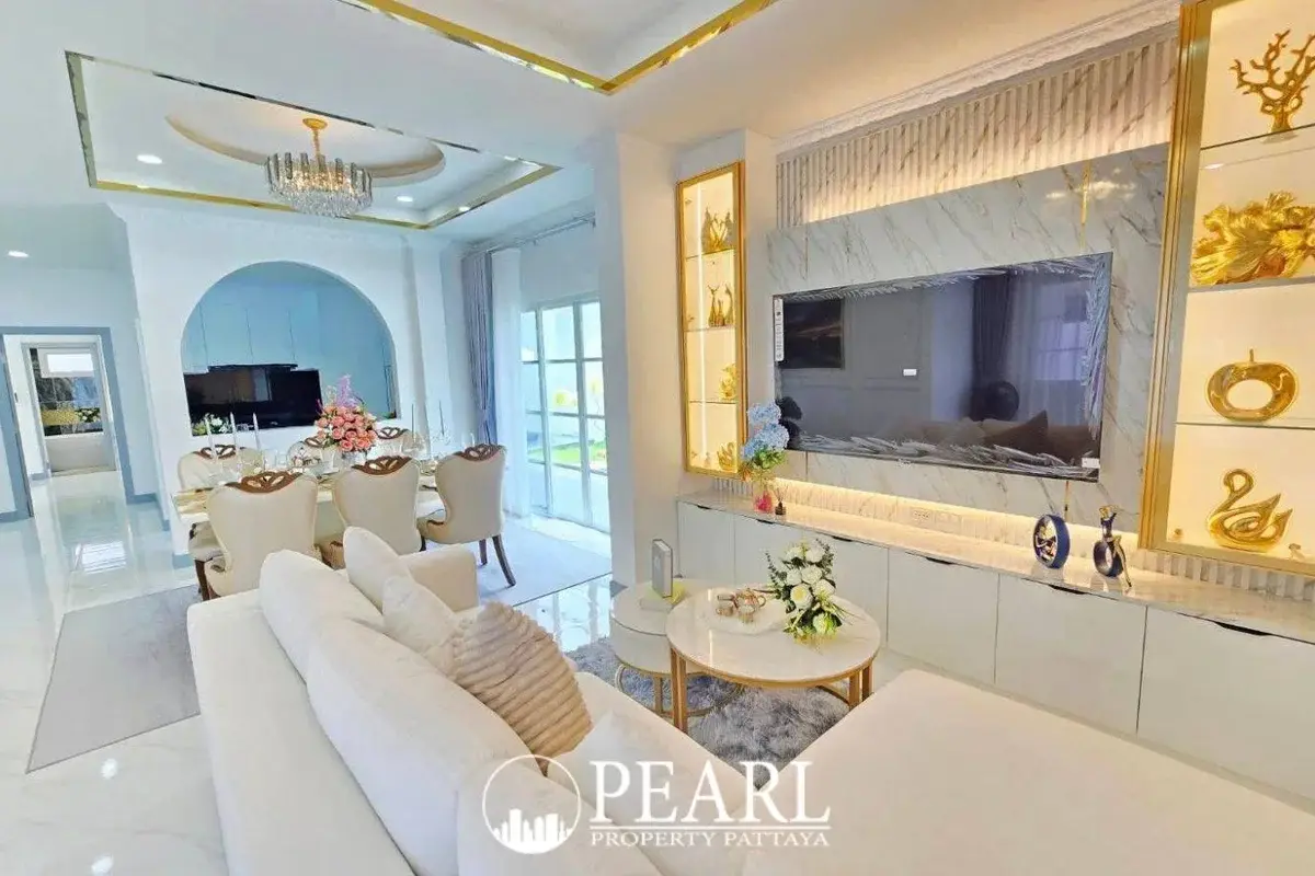 4 Bedroom House for Sale in Baan Suan Suwattana Phase 2 front facade with garden