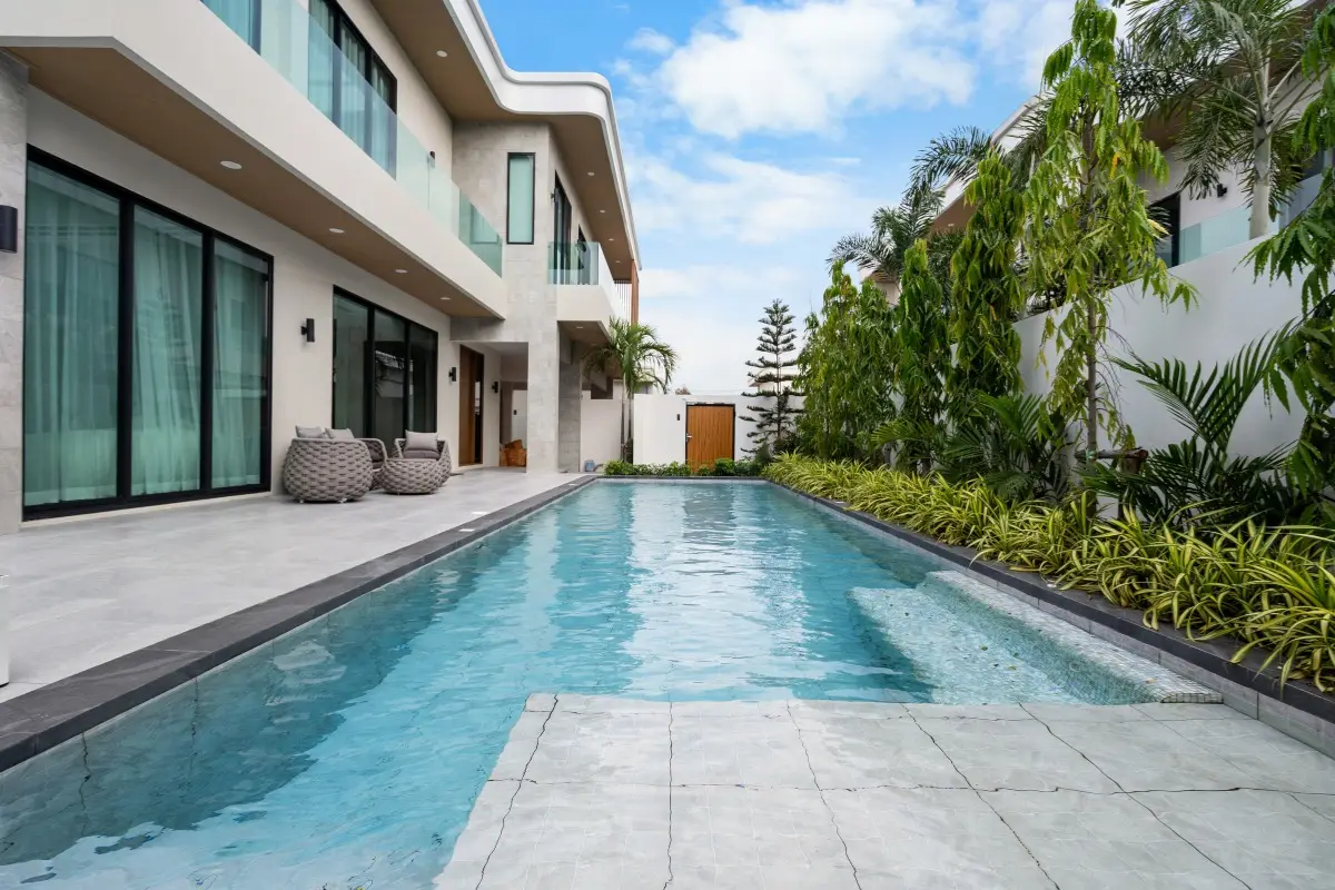 4 Bedroom House for Sale in Perla Villa spacious living room with sofa