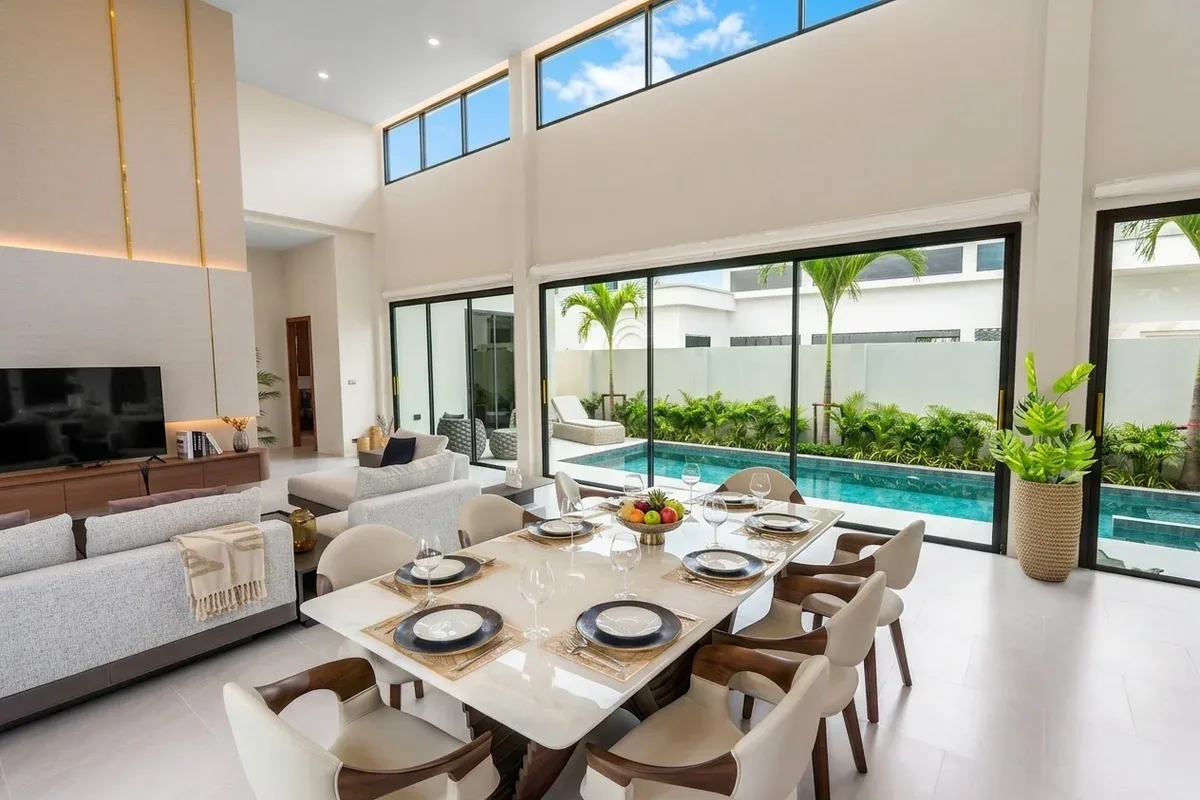 3 Bedroom House for Sale at Perla Villa, elegant entrance gate sign for Perla Villa with palm trees and modern architecture.