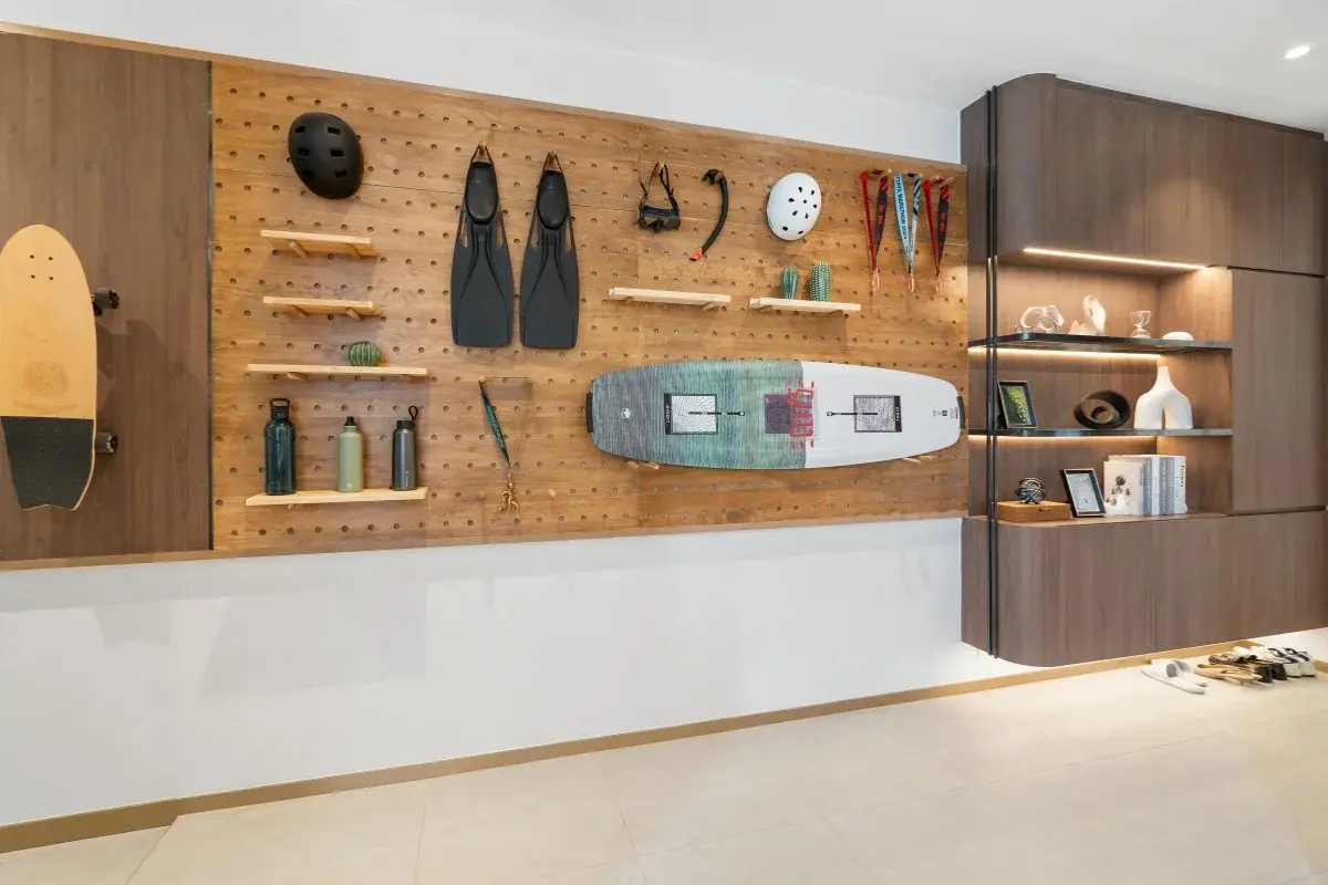 1 Bedroom Condo for Sale at Once Wong Amat: modern wall display with pegboard holding a surfboard, skateboard, and fins.