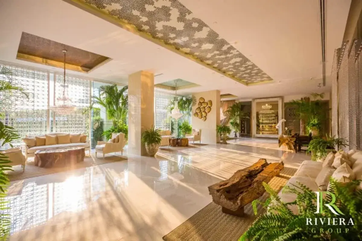 1 Bedroom Condo for Sale in The Riviera Wongamat living room with sofa and TV