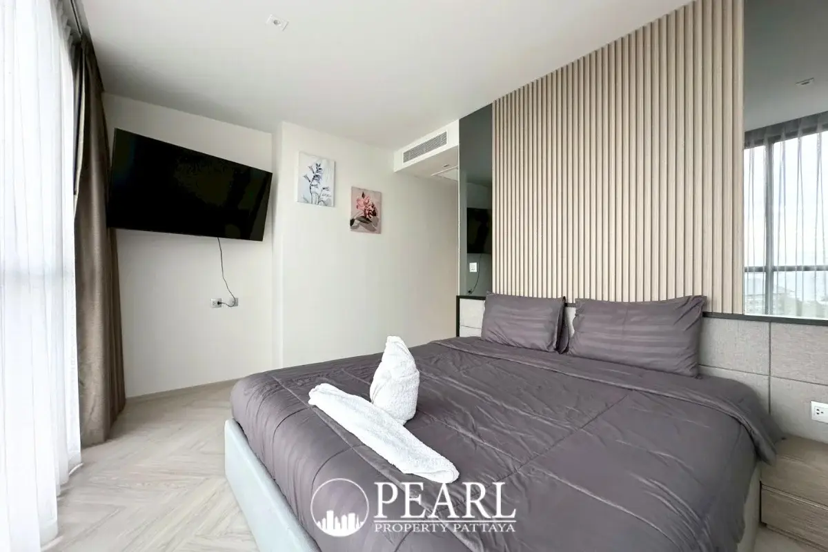 2 Bedroom Condo for Sale in Andromeda Condominium master bedroom with king-size bed