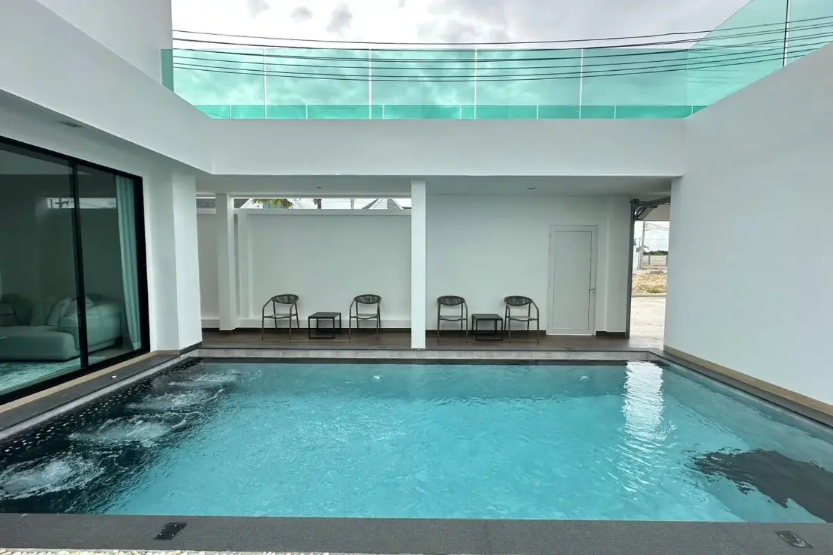 3 Bedroom House for Sale at Larelana Villa indoor swimming pool with spa jets and seating area.