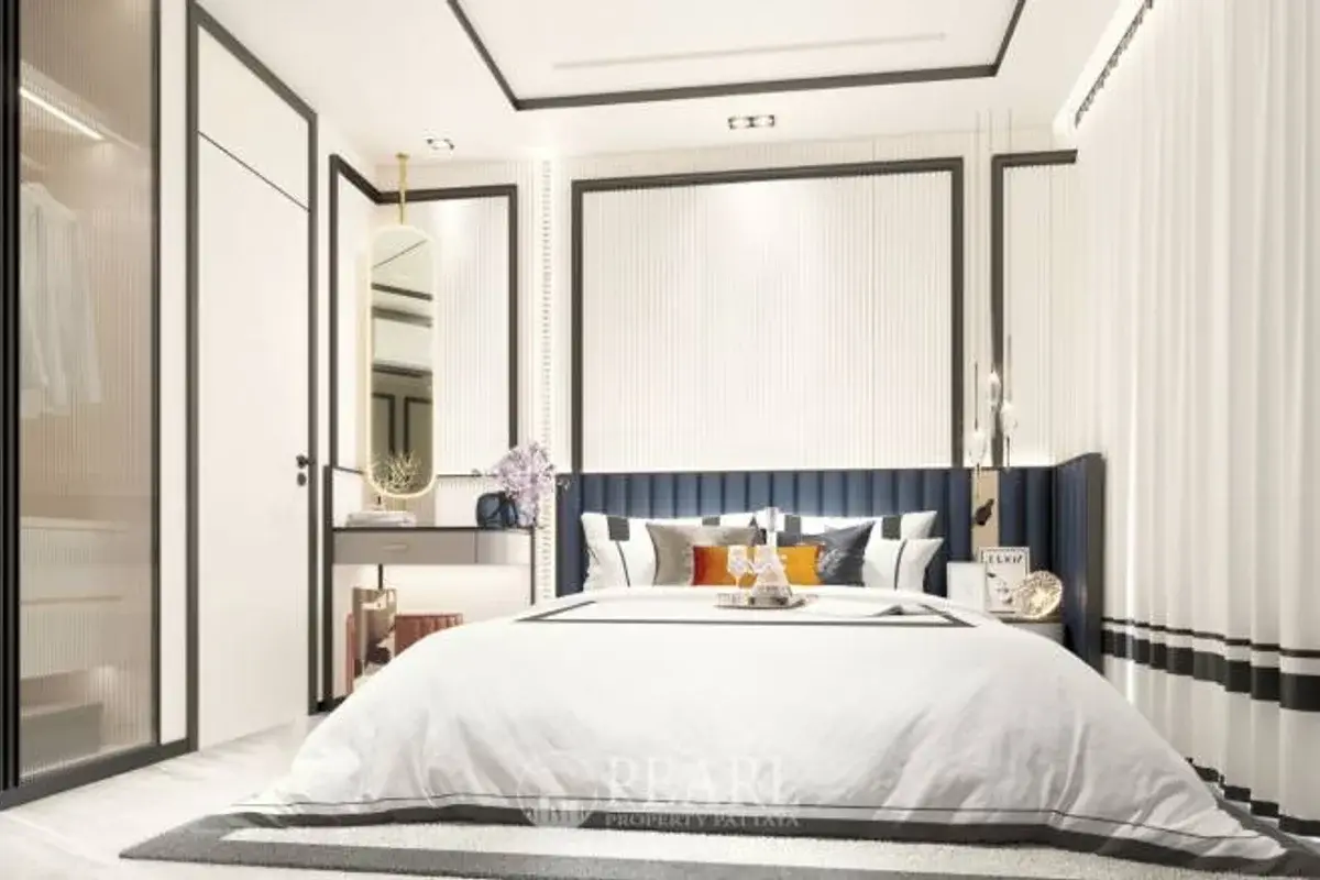 1 Bedroom Condo for Sale in The Embassy Jomtien comfortable bedroom with bed and window