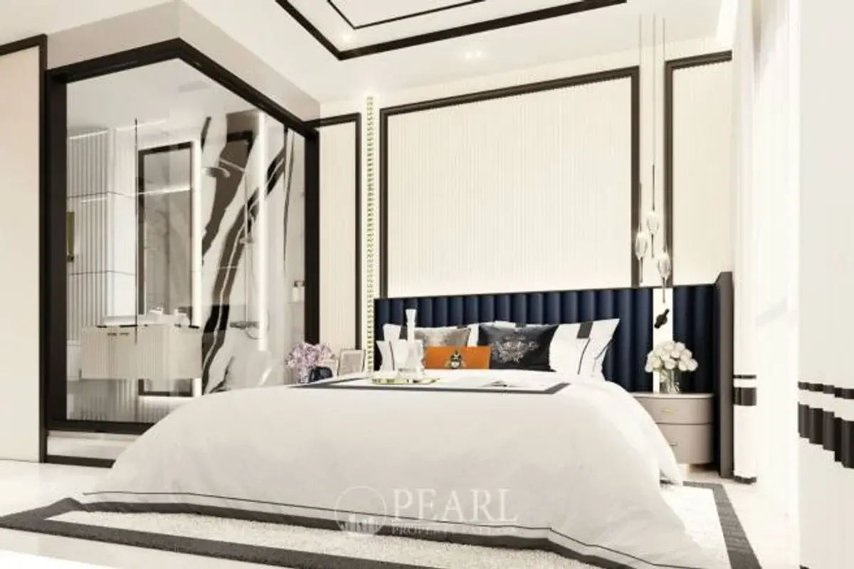 2 Bedroom Condo for Sale in The Embassy Jomtien master bedroom with king-size bed