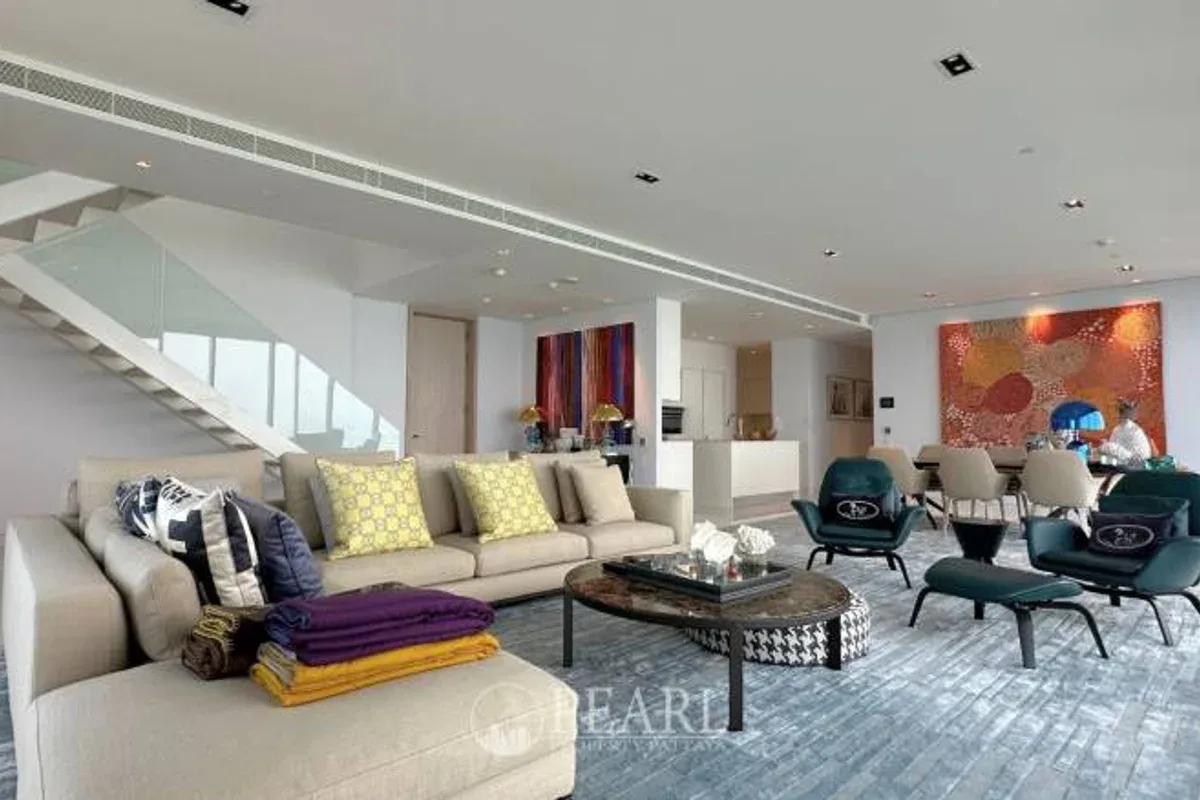 2 Bedroom Condo for Sale at Northpoint living room with sofa and TV