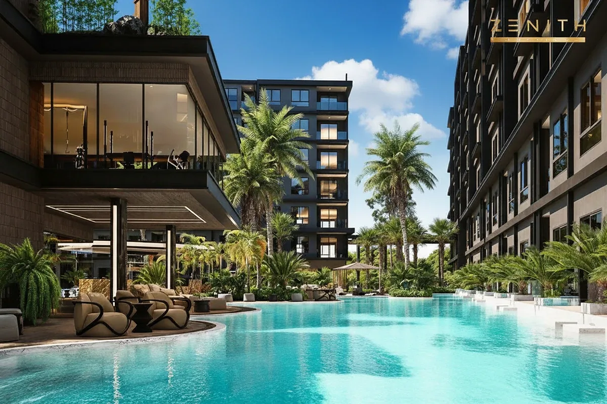 Zenith Pattaya aerial view of modern condo complex with multiple pools, lush rooftop gardens, and palm trees.