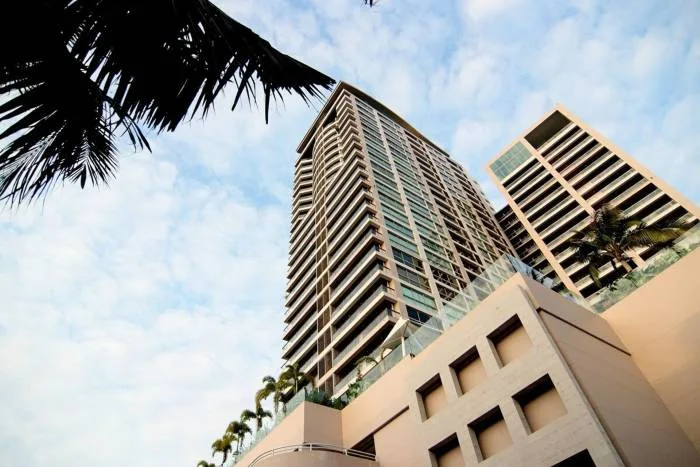Northshore Pattaya elegant lobby reception desk with a marble finish and a backlit "NORTHSHORE" sign.