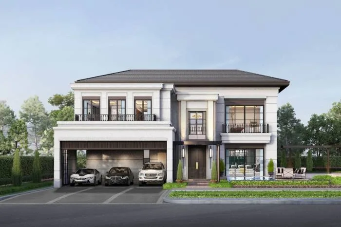 Arcade modern two-story house with a three-car garage, main entrance, and outdoor seating area.