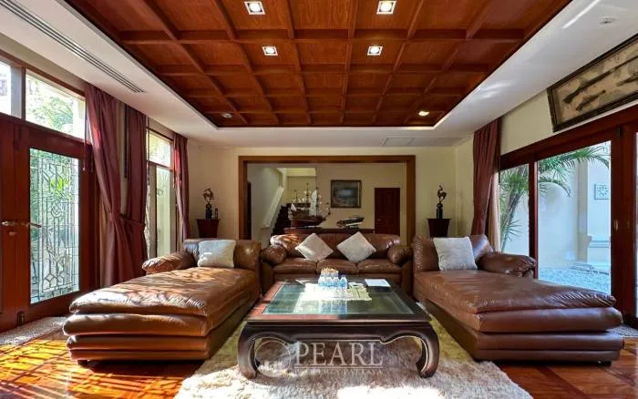 4 Bedroom Villa for Sale in Bang Lamung private swimming pool surrounded by lush garden