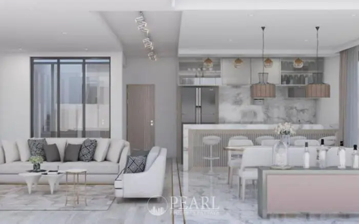 M Estate open-plan living room and dining area with white sofas and a wall-mounted TV.