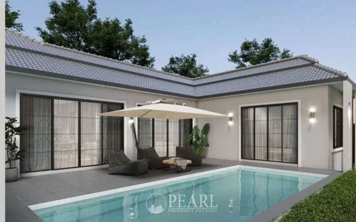 Living 17 At Siam Country house exterior with private swimming pool, patio, outdoor seating, and large sliding glass doors.