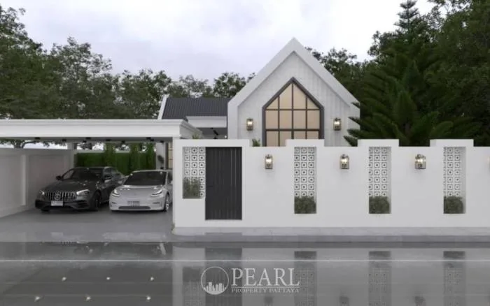 Living 36 At Pong Mabprachan Lake Pattaya modern white house exterior with gabled roof, fence, gate, and carport with two cars.