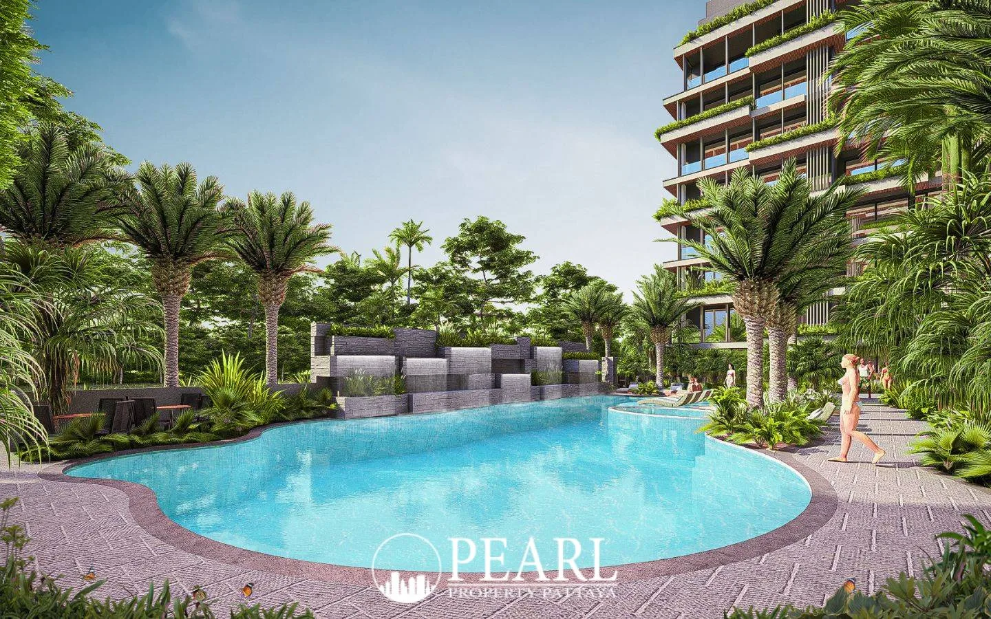 Siam Oriental Oasis resort-style swimming pool with waterfall feature, surrounded by lush tropical foliage and lounge chairs.