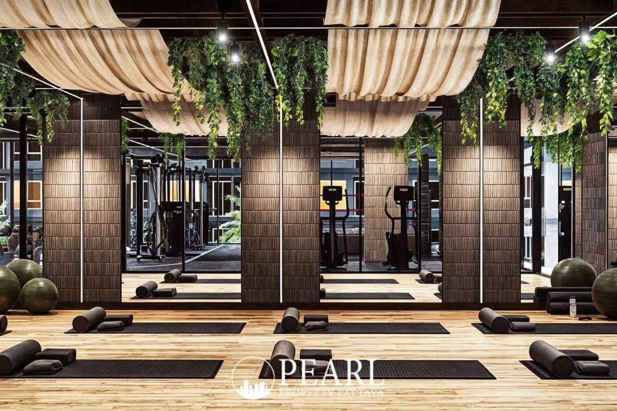 Zenith Pattaya stylish cafe and lounge area with marble countertops, modern seating, and decorative lighting.