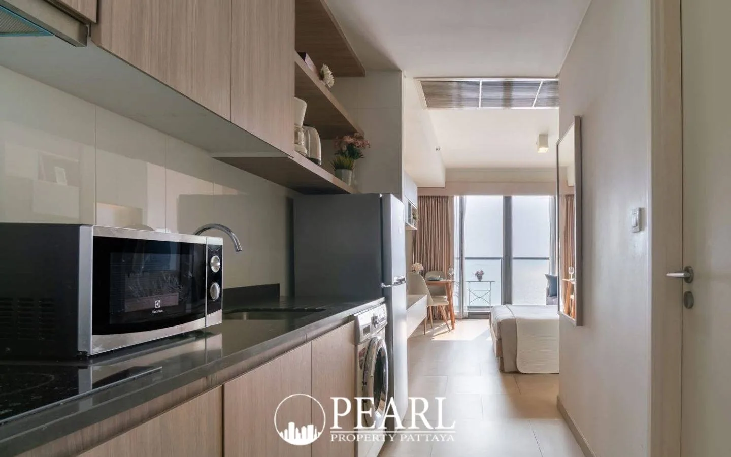 1 Bedroom Condo for Sale in Zire Wongamat spacious bedroom with balcony access