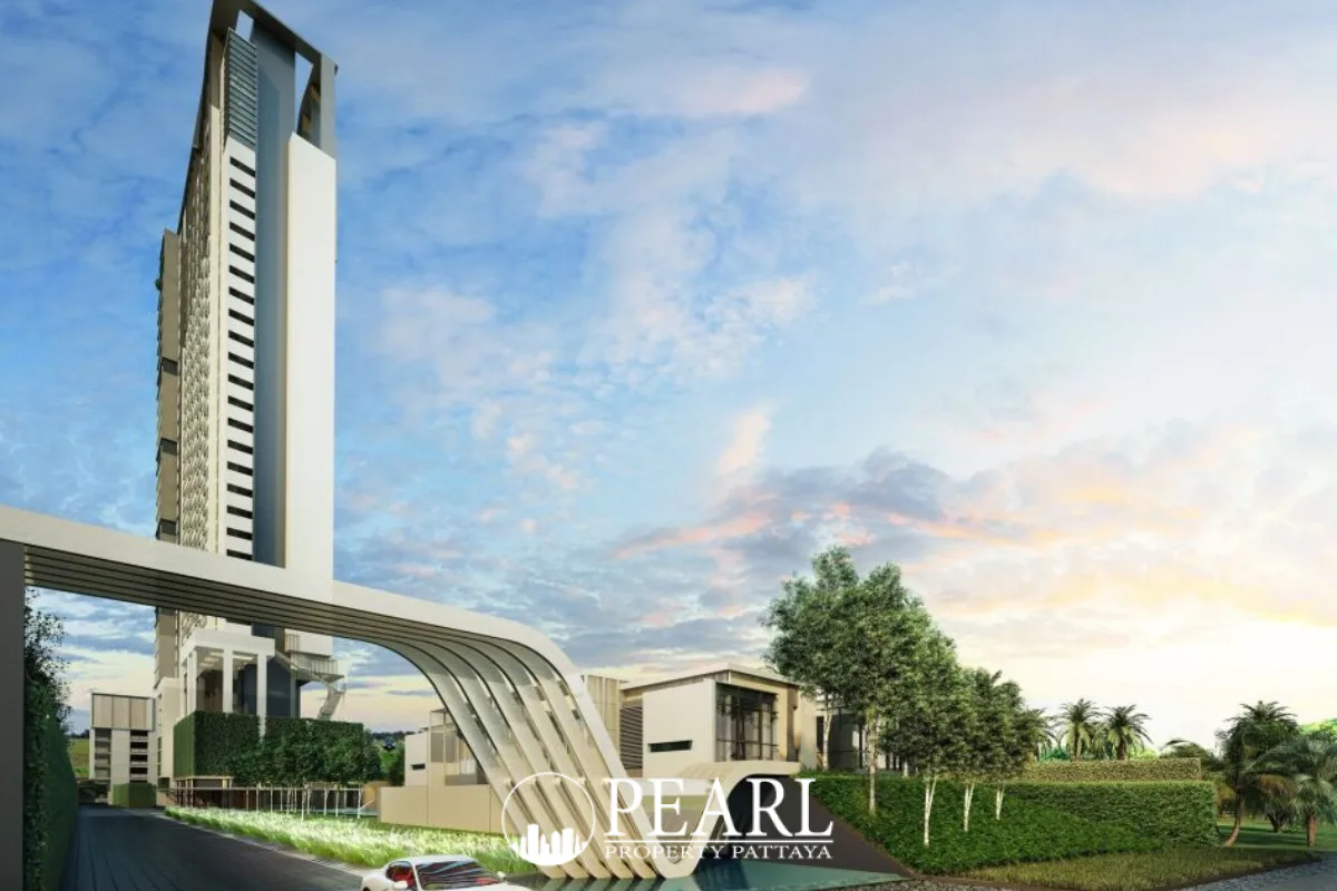 Veranda Residence Pattaya modern high-rise condo building with sleek entrance archway and landscaped greenery.