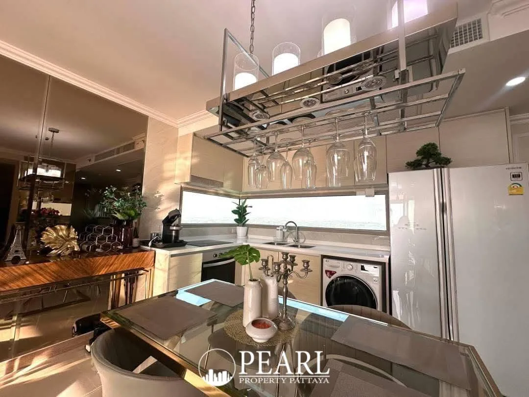 2 Bedroom Condo for Sale in The Riviera Jomtien master bedroom with balcony access