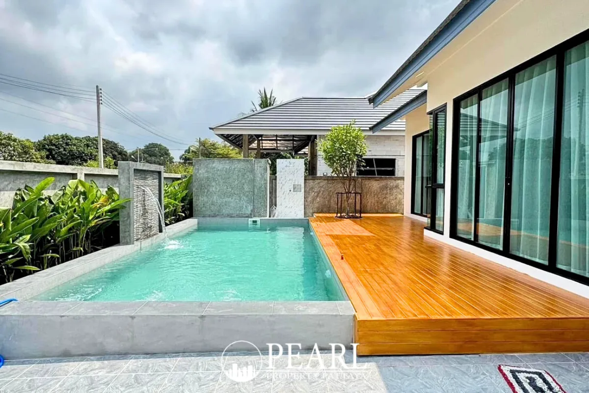 4 Bedroom House for Sale in Tropical Village private swimming pool with sun loungers