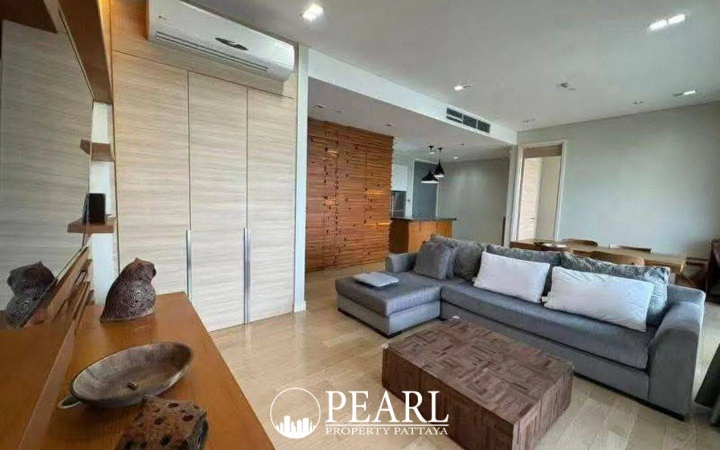 1 Bedroom Condo for Sale in Reflection Jomtien Beach living room with sofa and TV