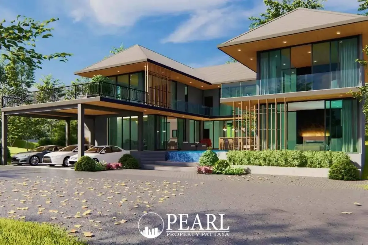 Horseshoe Point modern condo exterior with glass facades, carport, and small outdoor pool.