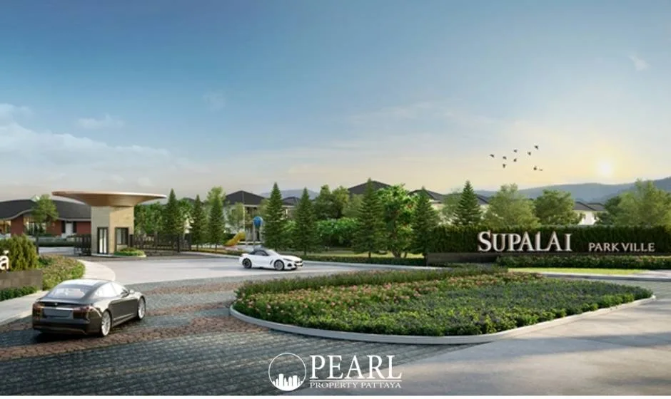 Supalai Parkville Pattaya-Sukhumvit rendered entrance with security booth, cars, and green landscaping.