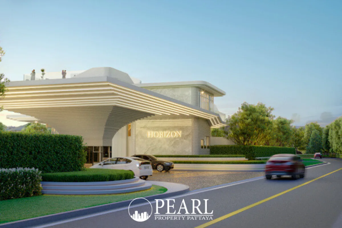 Horizon By Patta main entrance building with a modern design, cars, and lush green landscaping under a clear sky.