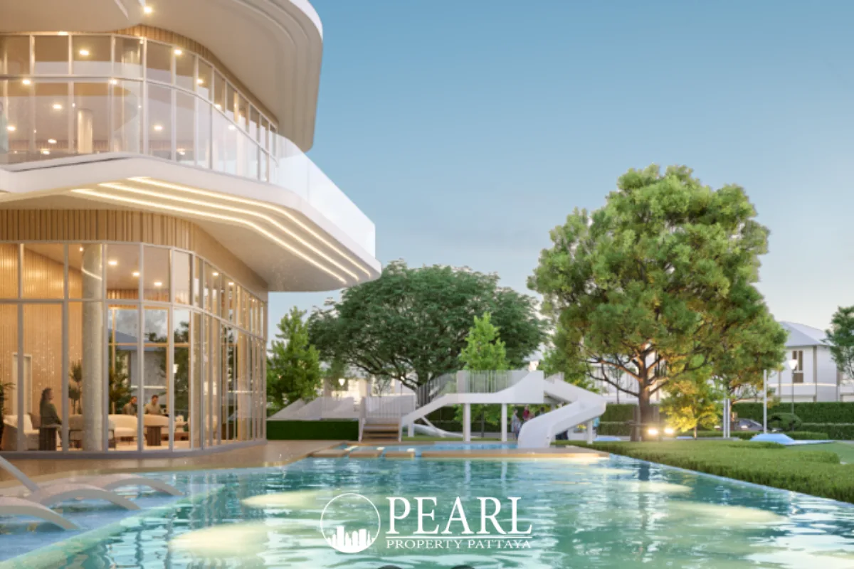 Horizon By Patta main entrance building with a modern design, cars, and lush green landscaping under a clear sky.