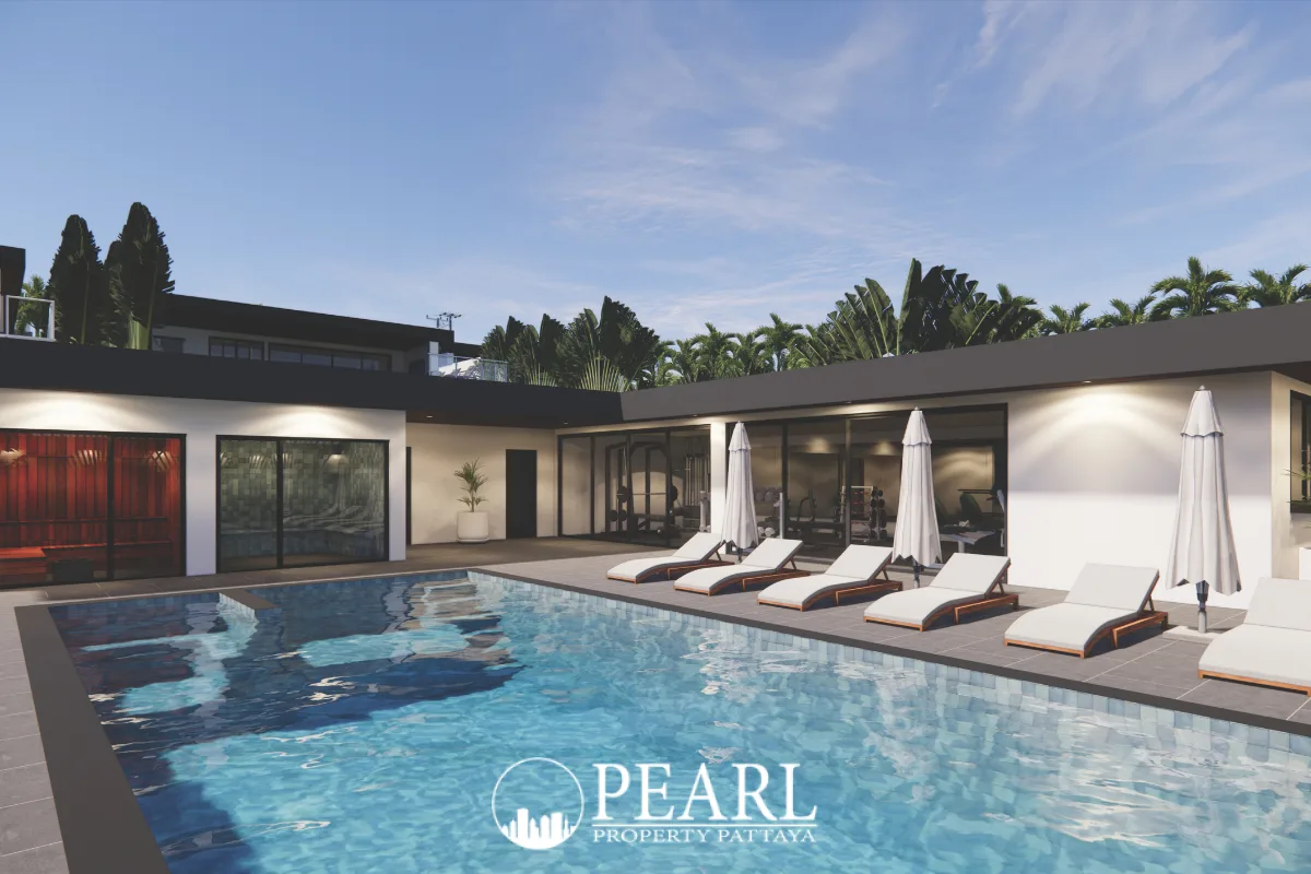 Siam Royal View Lakeside large outdoor swimming pool with lounge chairs, umbrellas, and modern architecture.