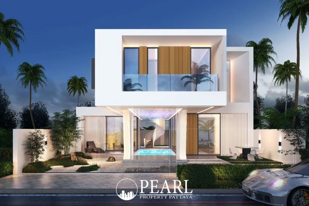 Young Life Villa aerial view of modern villa complex with palm trees and green landscaping.