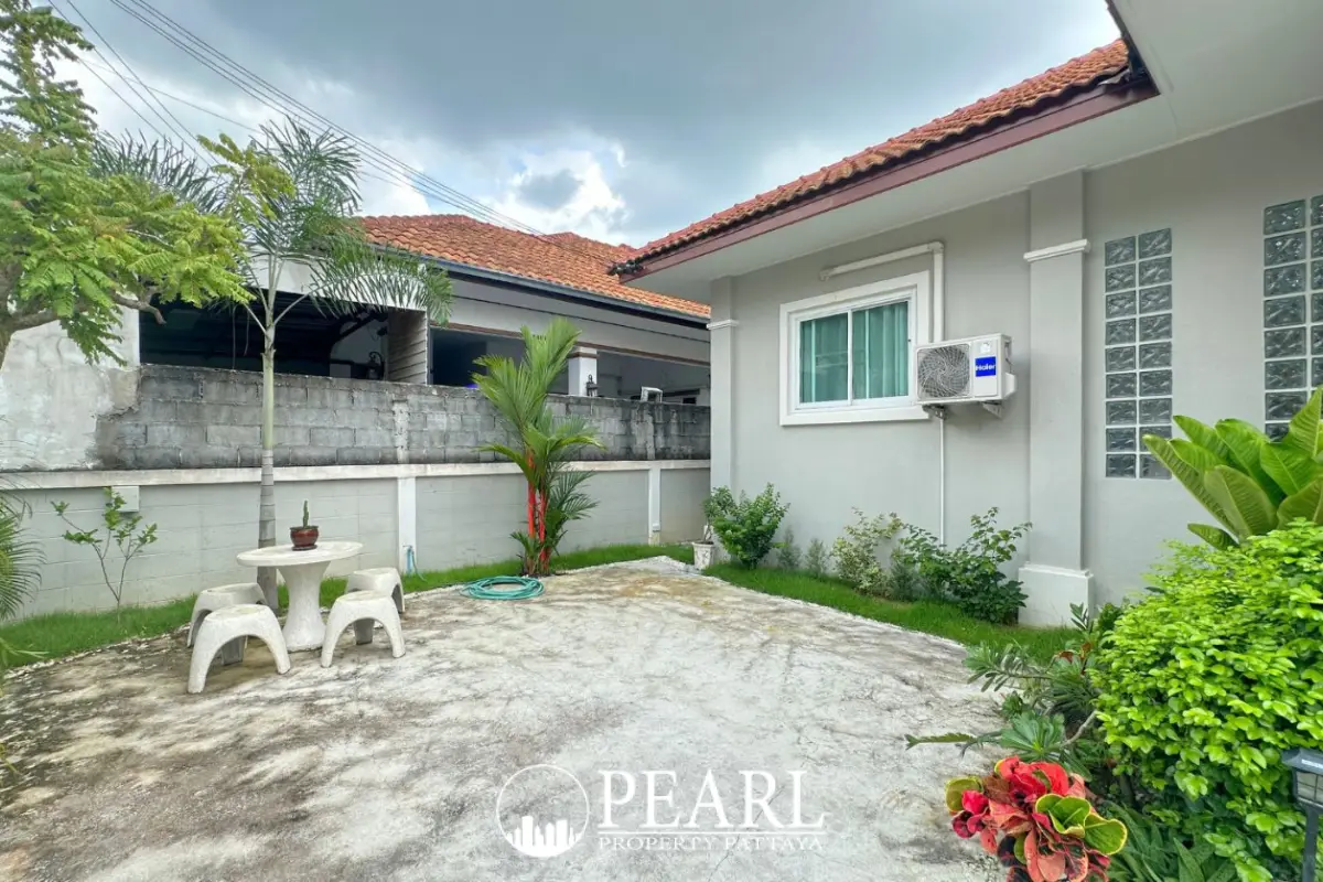Chaiyaphruek Silver Bell Village single-story house with red tile roof and carport.