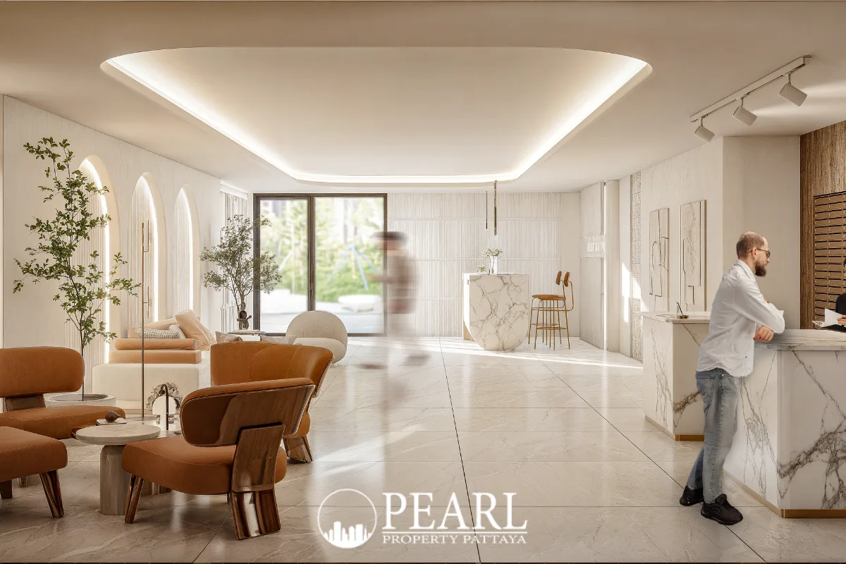 Avenue Boutique Pattaya: Stylish lobby interior with marble reception desk, lounge seating, and natural light.