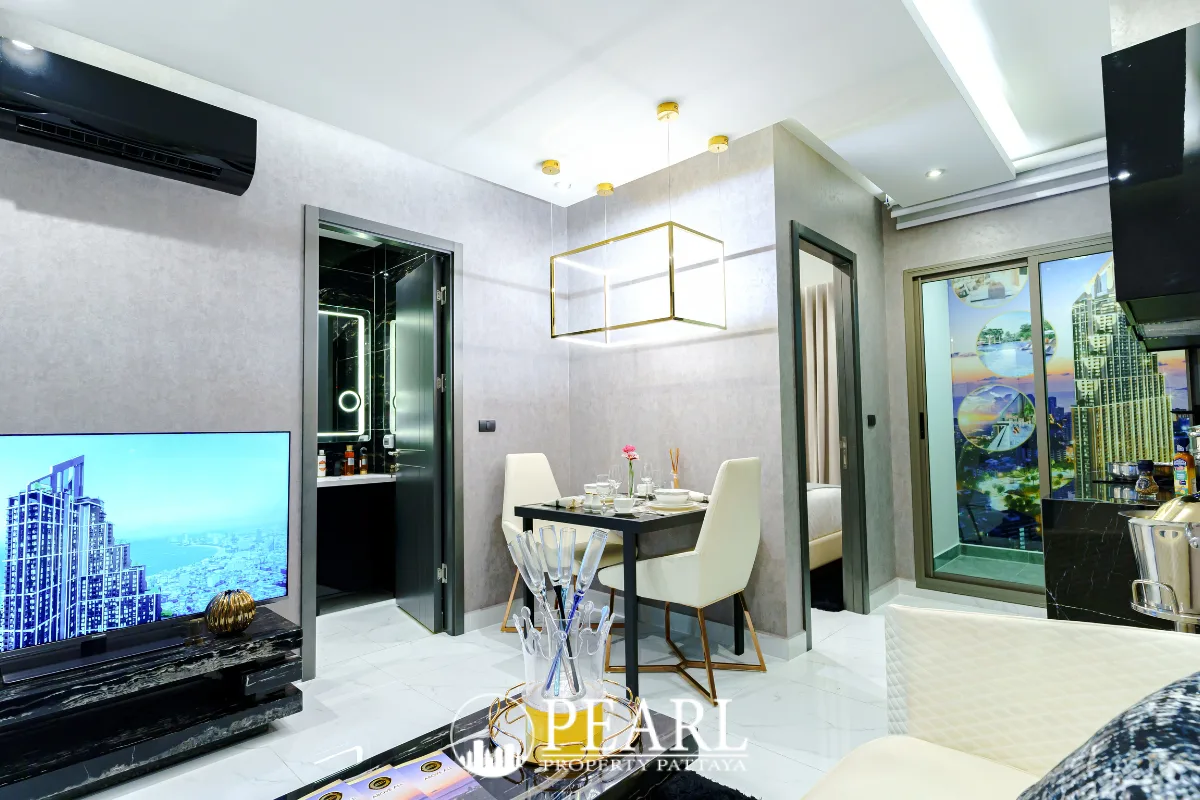 1 Bedroom Condo for Sale at Grand Solaire Pattaya comfortable bedroom with balcony access
