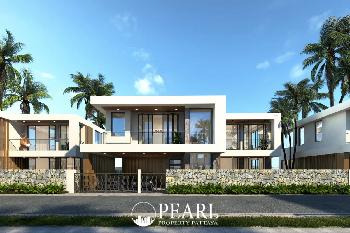 Lavender Villa modern white house exterior with large windows, balconies, palm trees, and stone wall fence.