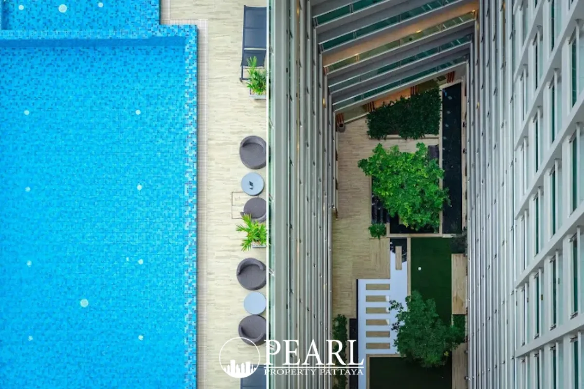 The Cloud aerial view of the outdoor swimming pool and the building's interior courtyard garden.