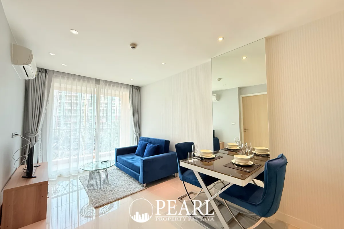 1 Bedroom Condo for Sale in Grande Caribbean modern living room with sofa