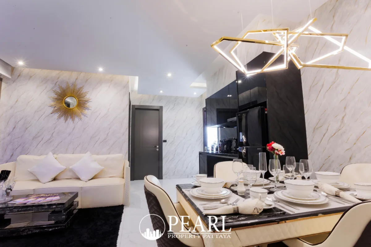 2 Bedroom Condo for Sale in Grand Solaire Pattaya master bedroom with king-size bed and city view