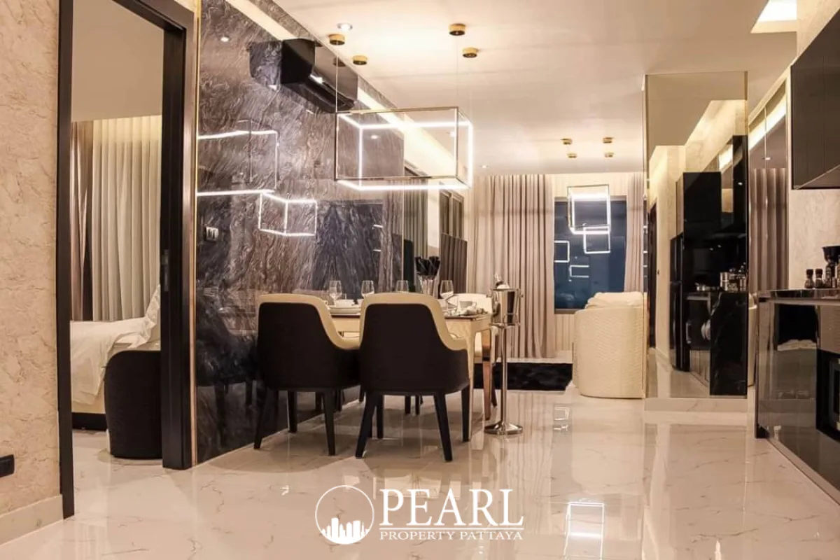 2 Bedroom Condo for Sale in Grand Solaire Pattaya master bedroom with king-size bed and city view