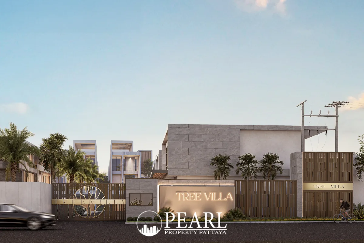 Tree Villa main entrance gate with illuminated sign and modern architectural facade.