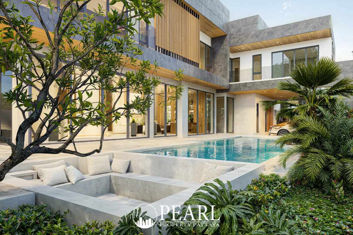 Tree Villa exterior with private pool, sunken lounge area, lush landscaping, and large windows.