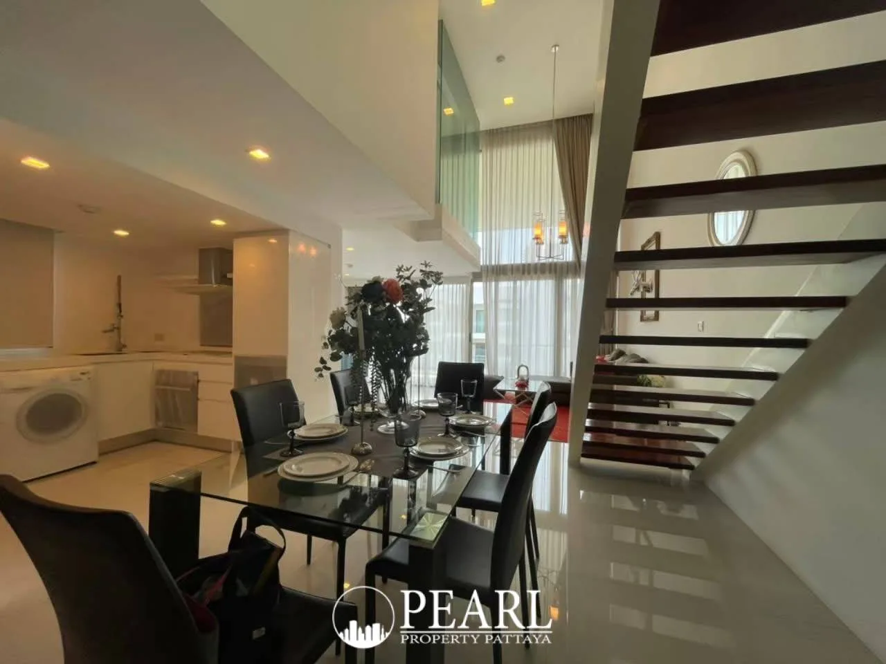 2 Bedroom Condo for Sale in The Sanctuary Wongamat master bedroom with king-size bed and ocean view