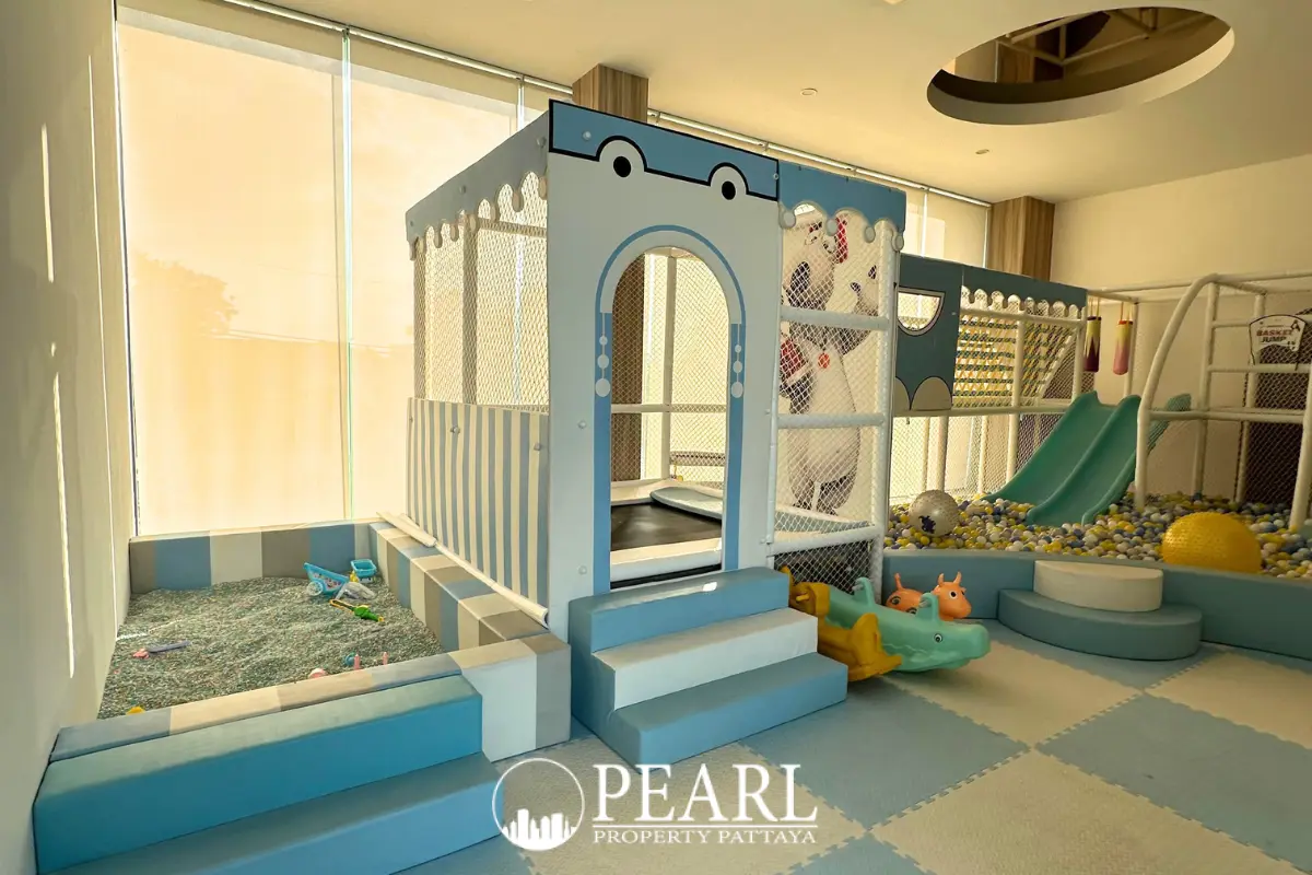 The Rich Garden well-equipped indoor gym with treadmills, exercise bikes, and weight machines.